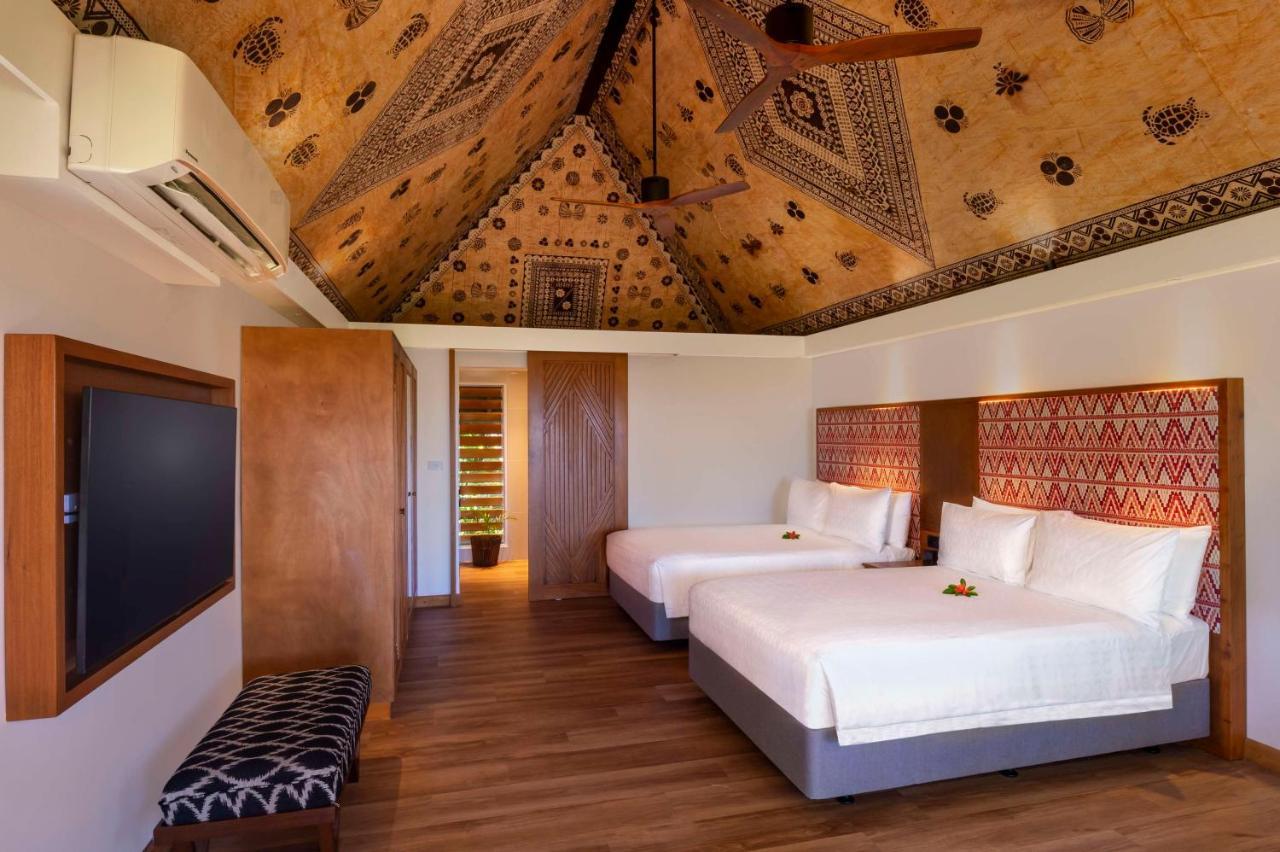 Outrigger Fiji Beach Resort Korotogo Esterno foto A bedroom at the Sheraton Resort Fiji