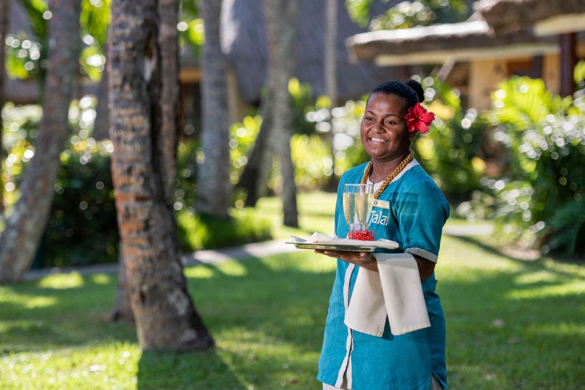 Outrigger Fiji Beach Resort Korotogo Esterno foto A hotel staff in Mauritius