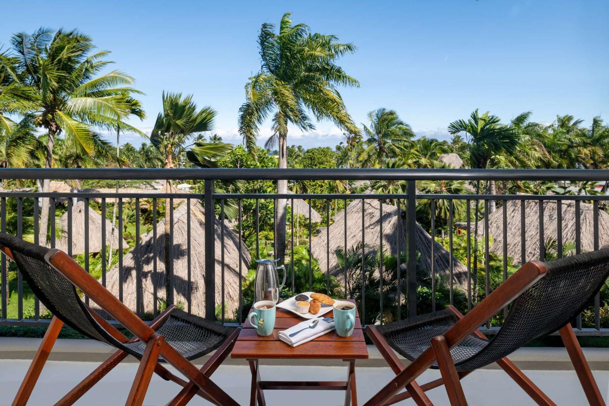 Outrigger Fiji Beach Resort Korotogo Esterno foto A balcony at the resort